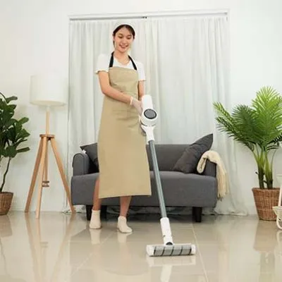 housekeeper-is-use-mop-with-vacuum-cleaner-to-hous-2024-10-17-22-47-58-utc.jpg